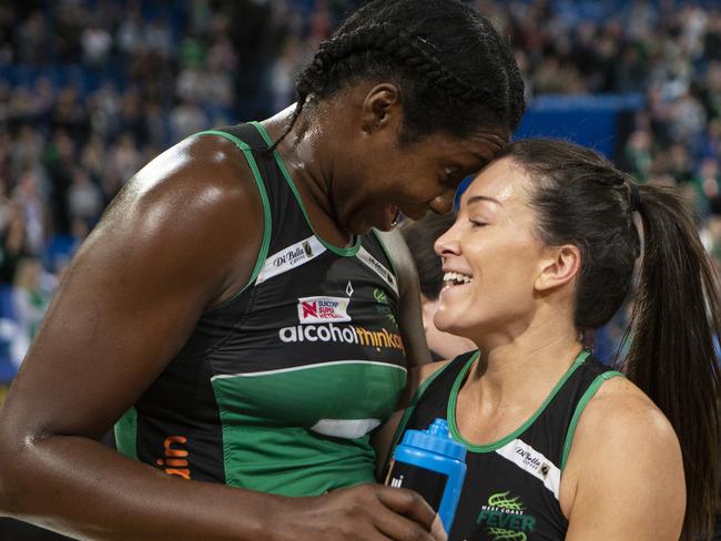 Fever players Jhaniele Fowler and Verity Charles celebrate their victory after the Round 13 Super Netball match between the West Coast Fever and the Melbourne Vixens at Perth Arena in Perth, Saturday, July 28, 2018. (AAP Image/Travis Anderson) NO ARCHIVING, EDITORIAL USE ONLY