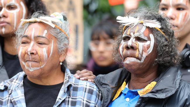 MELBOURNE, AUSTRALIA - NOVEMBER 15: Therese Bourke and Carol Puruntatameri members of the Munupi Clan from the Tiwi Islands stand together at the front of the Federal Court Of Australia on November 15, 2022 in Melbourne, Australia. The Federal Court is hearing an appeal by Santos Ltd., which seeks to restart drilling in the Barossa Gas project, located near the Tiwi Islands off the northern coast of Australia. Courts had earlier ruled the approval for drilling in the project as invalid. (Photo by Tamati Smith/Getty Images)