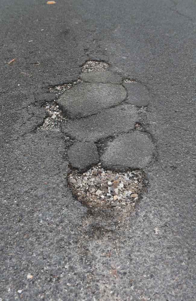 A pothole on Edmund Rice Drive. Picture: Richard Gosling