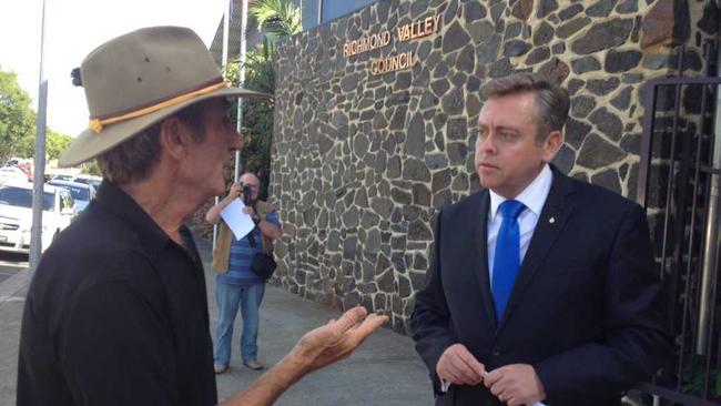 Spokesman for Gasfield Free Northern Rivers, Ian Gaillard, confronts NSW Minister for Resources and Energy, Anthony Roberts, outside Richmond Valley Council Chambers. Picture: Hamish Broome