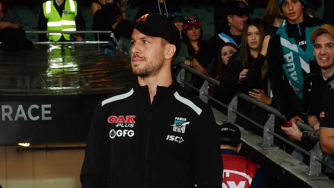 Travis Boak of Port Adelaide watches from the stands on Saturday. Picture: Mark Brake/Getty Images