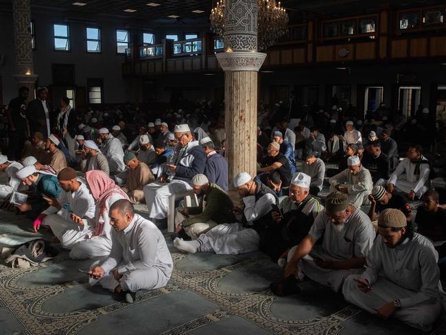 Muslim worshippers recite verses of the Koran during a Solidarity with Palestine event, at the al Quds Mosque in Cape Town. Picture: AFP