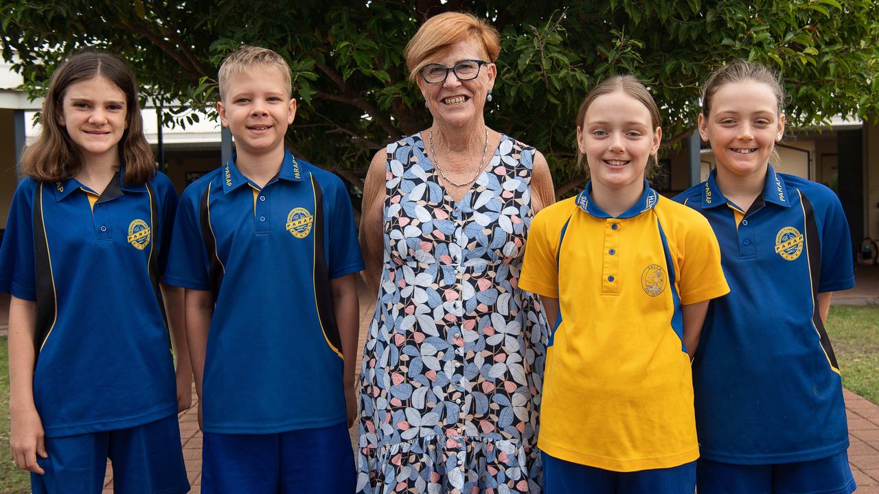 Parap Primary School students Thembi Hawke, Thomas Jelly, and Ruby and Isabelle Atkinson helped principal Yvonne Harding celebrate her final day at the school after almost 26 years. Picture: Pema Tamang Pakhrin