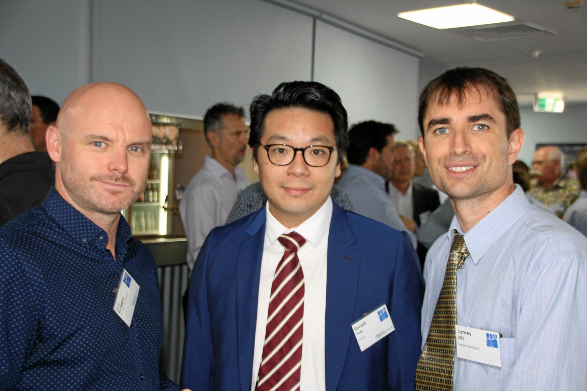 Ronald Yuen of Gadens, centre, with Paul Gallagher and James Lillie of Sunshine Coast Council at the Urban Development Institute of Australia (Qld) breakfast at Maroochydore Surf Club last Friday. Picture: Erle Levey