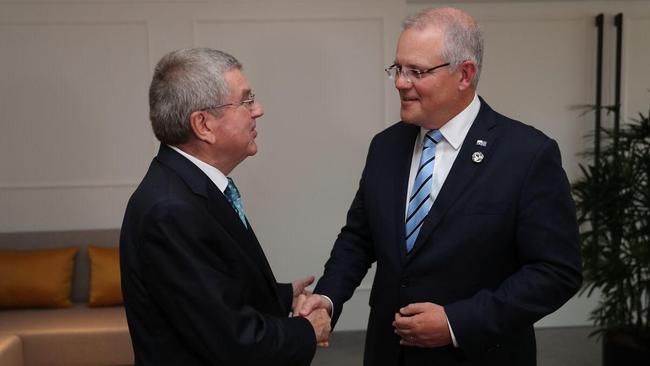 Prime Minister Scott Morrison with IOC boss Thomas Bach in Osaka to discuss the 2032 Games bid.