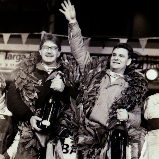 1992 winning driver Greg Crick, right, and his navigator Greg Preece acknowledge the crowd after winning Targa Tasmania. Picture Kim Eiszele