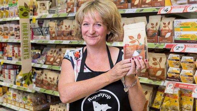 Jenny Moore in a Coles store with Coles branded le puy lentils supplied by her brother David Matthews' farm near Rupanyup.