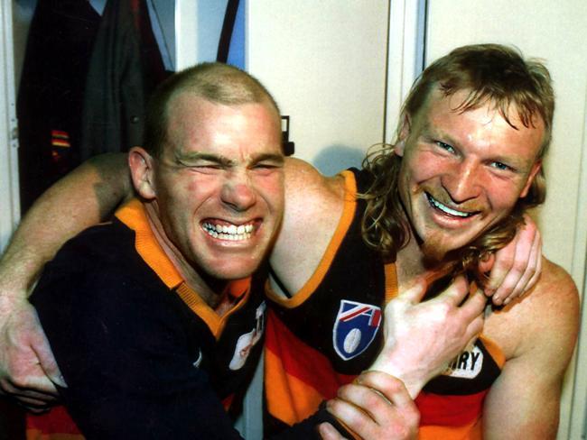 Andrew Jarman, left, with Wayne Weidemann celebrating their first elimination final victory.