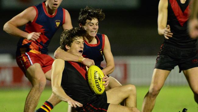 Action from Trinity’s win over Rostrevor in college footy at Norwood Oval on Wednesday night. Picture: Michael Marschall