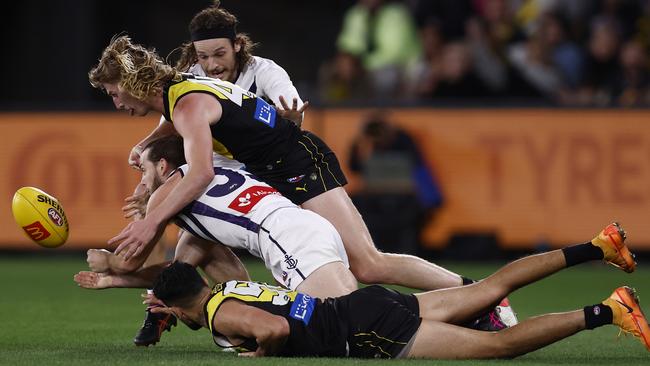 Docker Travis Colyer is tackled by Richmond’s Hugo Ralphsmith. Picture: Darrian Traynor/Getty Images