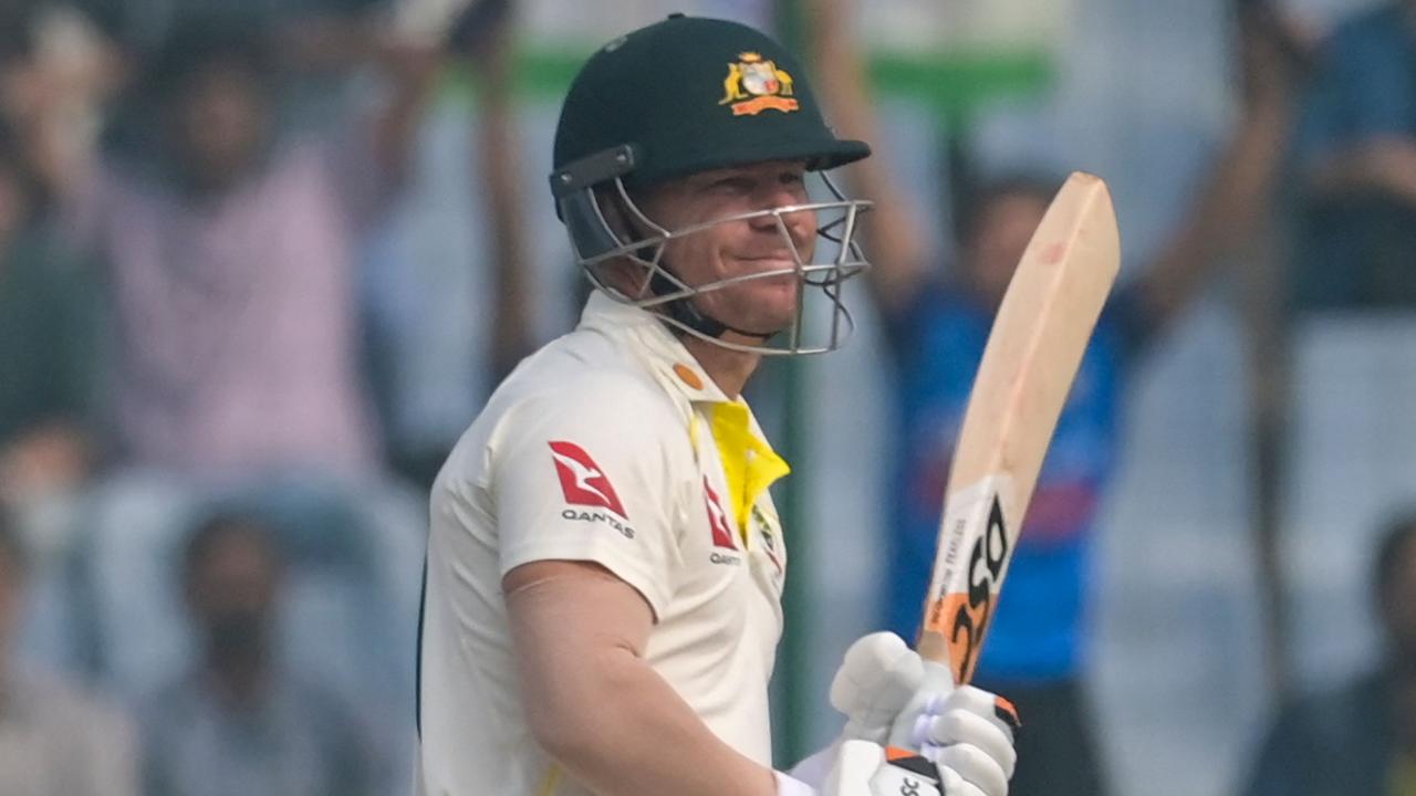 David Warner batting on day one of the Delhi Test before being struck on the helmet.