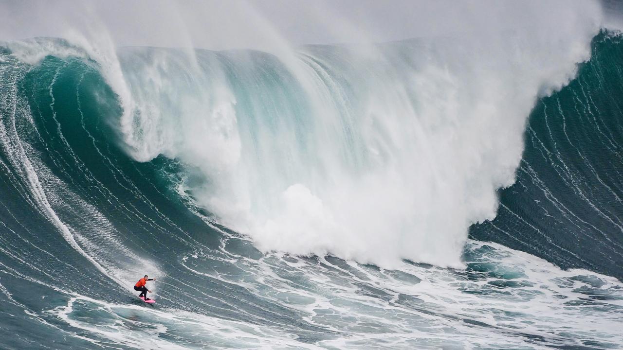 Brazilian surfer Maya Gabeira rides a wave during the World Surf League Nazare Big Wave Challenge in Nazare, Portugal. Picture: Miguel Riopa/AFP