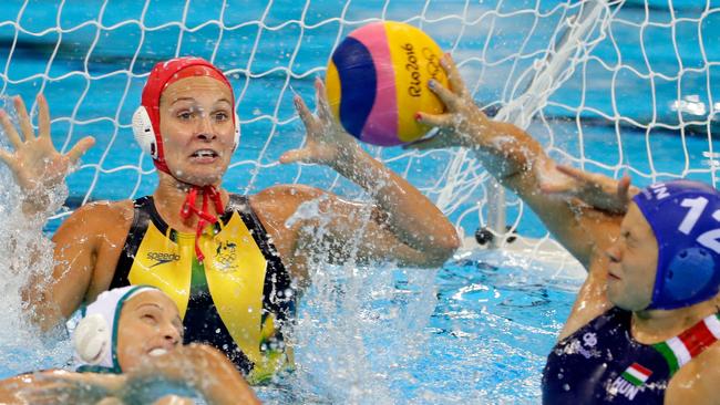 Lea Yanitsas defends as Krisztina Garda of Hungary takes a shot on goal during their Women's Water Polo quarterfinal match against Australia at the Rio 2016 Olympic Games. Picture: Jamie Squire/Getty Images.