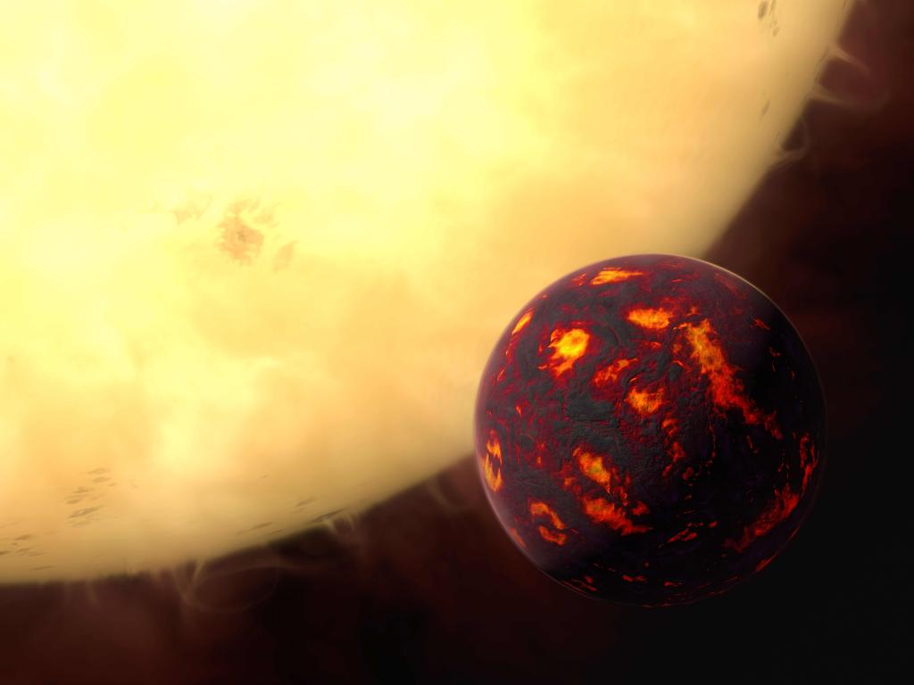 A an image released by the European Space Agency / Hubble shows an artist’s impression of the super-Earth 55 Cancri e in front of its parent star. Using observations made with the NASA/ESA Hubble Space Telescope and new analytic software scientists were able to analyse the composition of its atmosphere. It was the first time this was possible for a super-Earth. 55 Cancri e is about 40 light-years away and orbits a star slightly smaller, cooler and less bright than our Sun. As the planet is so close to its parent star, one year lasts only 18 hours and temperatures on the surface are thought to reach around 2000 degrees Celsius. Picture: AFP / ESA/Hubble / M. KORNMESSER