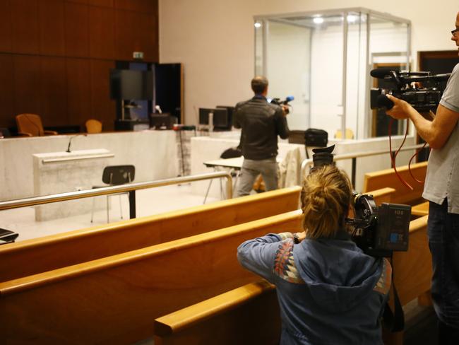 Reporters film inside the courtroom before the court ruled on the case involving the Duchess of Cambridge. Picture: AP