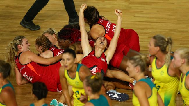 England celebrate their incredible victory.