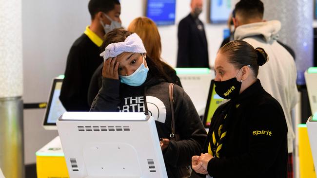 A passenger checks in for a flight at Los Angeles International Airport ahead of the Thanksgiving holiday. Picture: AFP