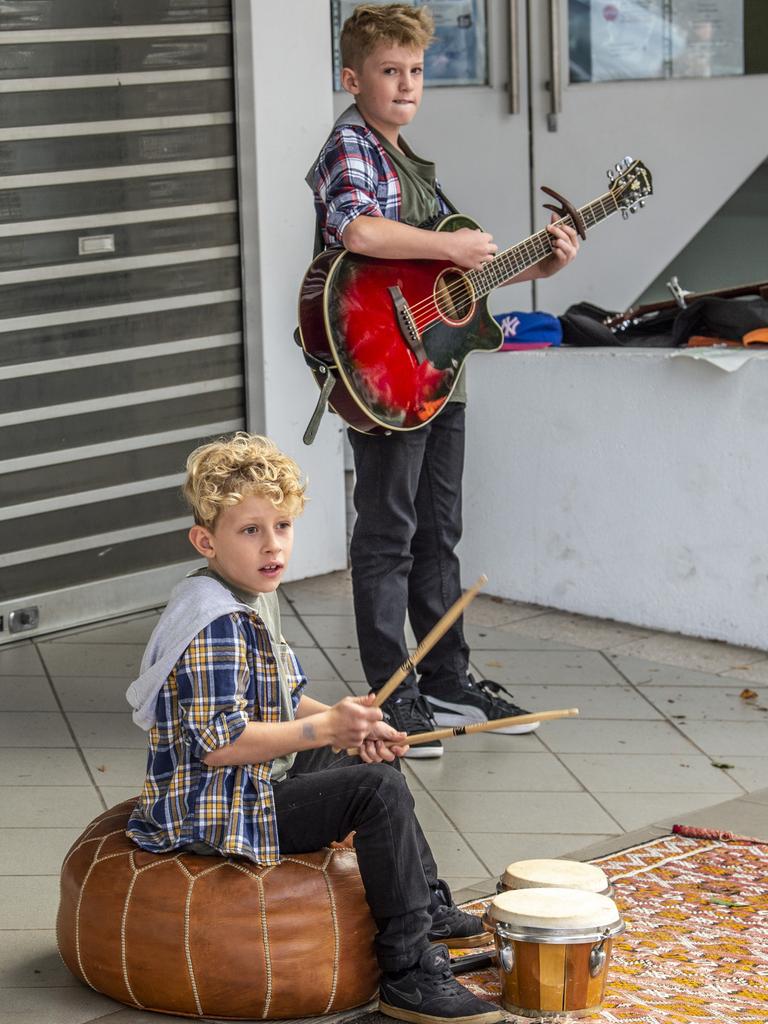 Jonah Finch (front) and Jacob Turner entertain the crowd at the Toowoomba Busking Festival. Picture: Nev Madsen.