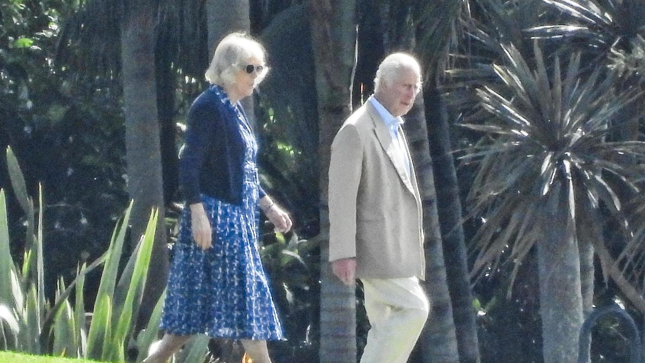 King Charles and Queen Camilla going for as very brief walk in the garden. PICTURE JULIAN ANDREWS