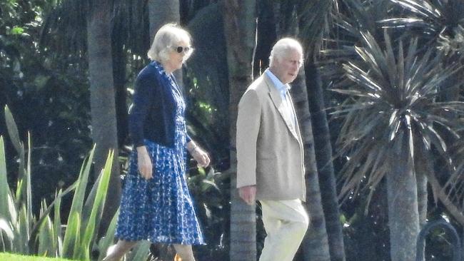 King Charles and Queen Camilla going for as very brief walk in the garden. PICTURE JULIAN ANDREWS