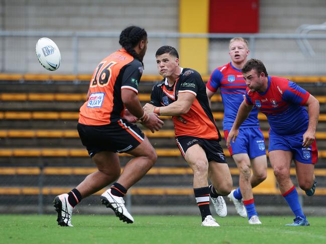 Tigers number 13, Braydon Guyan gets a pass away. Picture: David Swift