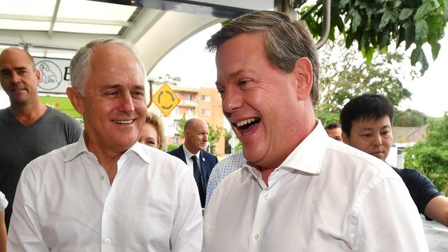 Prime Minister Malcolm Turnbull (left) and Queensland OppositIon Leader Tim Nicholls (right) during a street walk at St Lucia in Brisbane during the campaign.