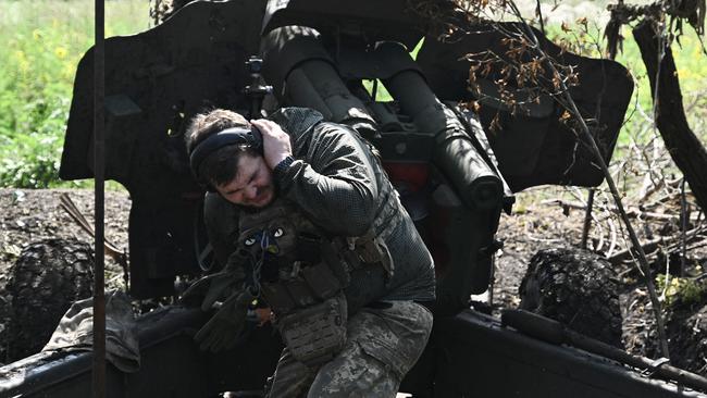 A Ukrainian artilleryman fires a 152mm-gun howitzer D-20 at Russian positions on the frontline near Bakhmut, eastern Ukraine. Picture: AFP