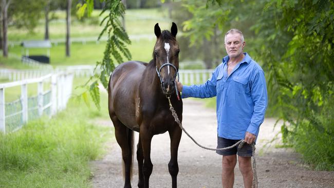 Scott Nicholls on his property at Jimboomba, where a subdivision on neighbouring land will result in a small-lot housing estate. PHOTO: AAP/Sarah Marshall