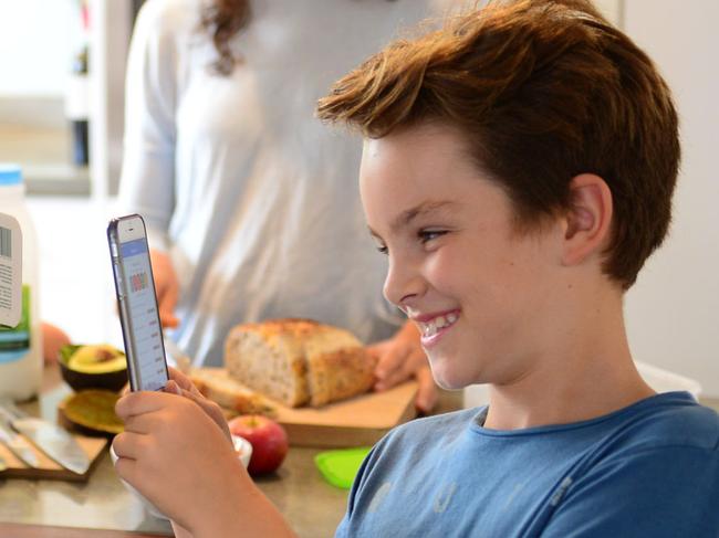 (Left-Right) Xiao Cao Neal, Amelia Donovan, Henry Donovan and Taminga Marges . Taminga Marges now uses smartphone app you can use to swipe on the barcode of packaged foods and it will give you a lower salt choice. Photo Jeremy Piper
