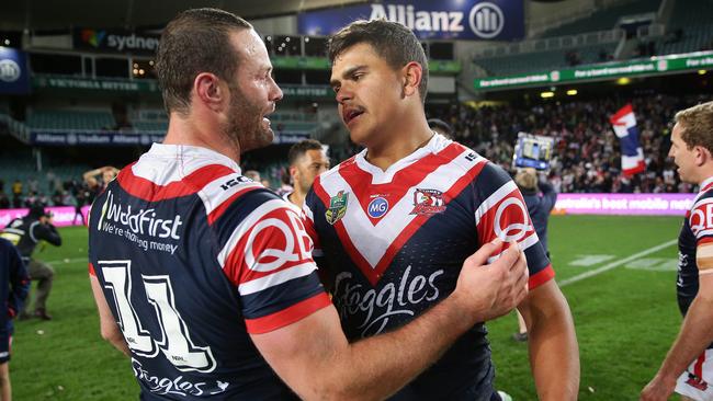 Roosters captain Boyd Cordner (left) says he wants Latrell Mitchell to stay at the club. Picture: Brett Costello