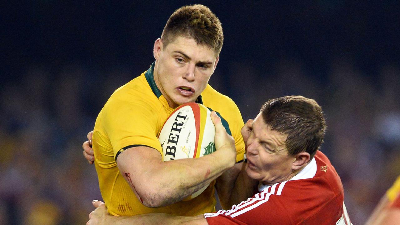 The Wallabies’ James O’Connor coming up against British and Irish Lions centre Brian O’Driscoll during the Lions’ last tour to Australia in 2013. Picture: William WEST / AFP