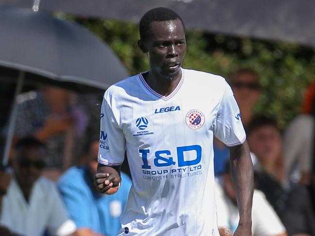 MELBOURNE, AUSTRALIA - FEBRUARY 10 2024 Kenjok Athiu of Dandenong City during the NPL Victoria game between Avondale v Dandenong City at Reggio Calabria Club.Picture: Brendan Beckett