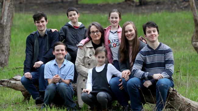 Anti-abortion campaigner Kathy Clubb with children Lucien, Tobias, Matthew, Danielle, Miriam, Eva and Elijah near their home in Melbourne’s Montmorency. Picture: David Geraghty