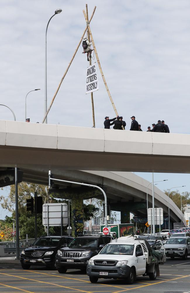 An Extinction Rebellion protestor blocks traffic on the Hale Street exit. Pic: Peter Wallis