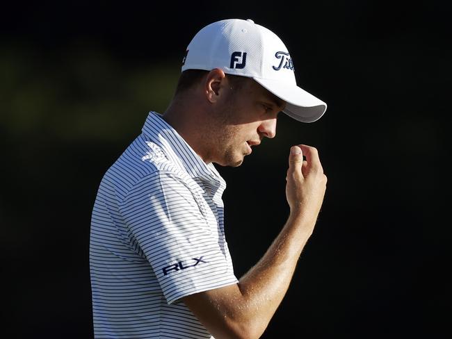 KAPALUA, HAWAII - JANUARY 09: Justin Thomas of the United States reacts on the 18th green during the third round of the Sentry Tournament Of Champions at the Kapalua Plantation Course on January 09, 2021 in Kapalua, Hawaii. (Photo by Cliff Hawkins/Getty Images)