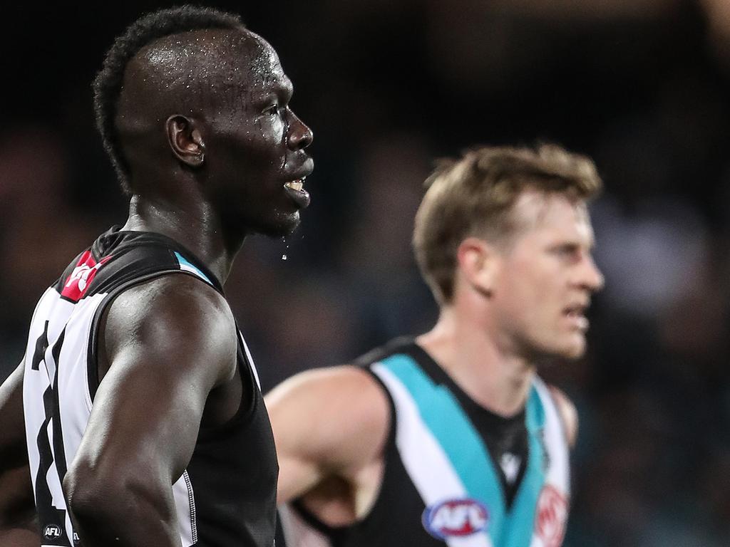 Aliir Aliir, with Jonas, after they fell to the Bulldogs by a heavy margin. Picture: AFL Photos/Getty Images