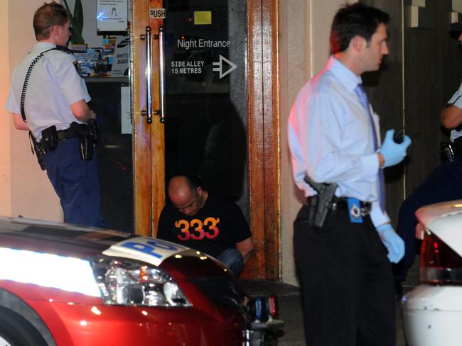 NSW Police arrested three people on Elizabeth St in Surry Hills after it was discoved that the trio were in possession of trafficable quantities of methamphetamine and heroine. Picture: Gordon McComiskie