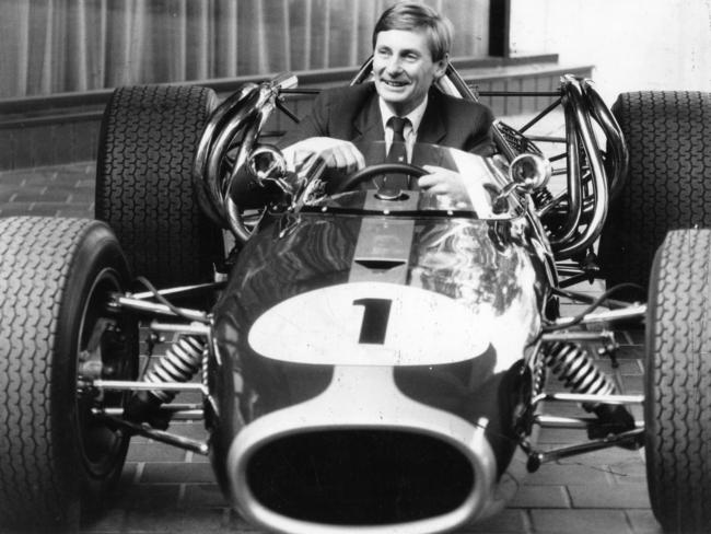 John Bannon in the Repco Brabham number 1 racing car at the Adelaide Festival Centre, to launch Australia's first Formula 1 Grand Prix in 1985.