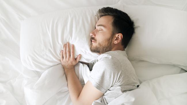 Lifestyle portrait of sleeping man