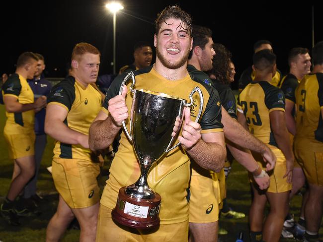 Fraser McReight celebrates with the trophy after winning the Oceania Rugby U20 Championship match between Australia and New Zealand at Bond University in 2019. Picture: Albert Perez/Getty Images