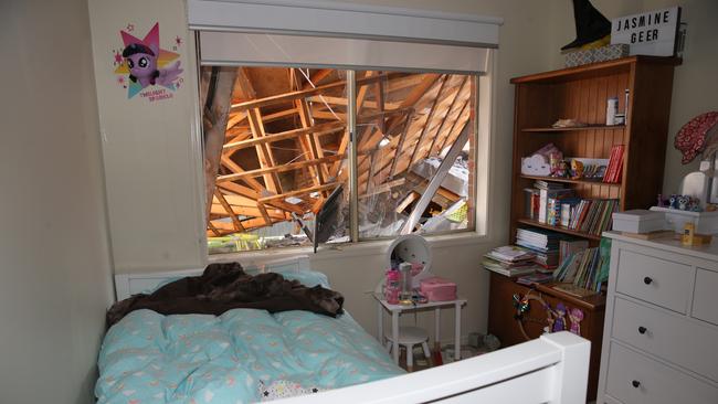 The damage, as seen from a child’s bedroom in the Geer family’s home. Picture: Peter Ristevski