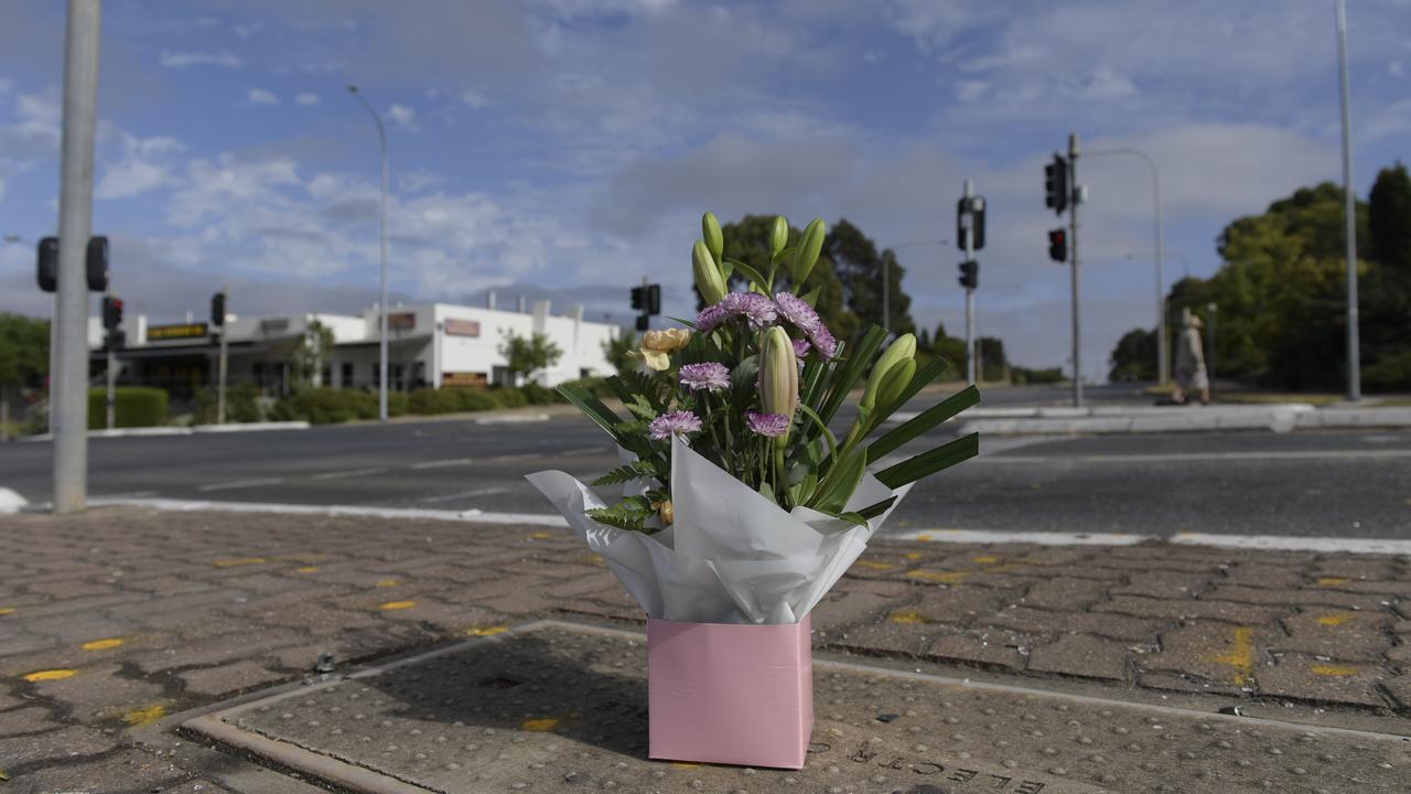 Flower tributes were laid following the crash to pay homage to the loss of life at the intersection of Atlantic Dr and The Golden Way. Picture: Roy VanDerVegt