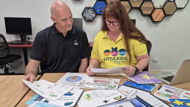 Curtis Dray and Kim Walters judge picture books ahead of the ninth annual Gympie Little Kids Big Day Out on Saturday, August 10.