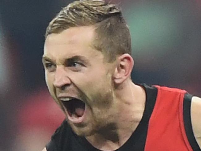 Devon Smith of the Bombers celebrates scoring a goal during the Round 10 AFL match between the Greater Western Sydney (GWS) Giants and the Essendon Bombers at Spotless Stadium in Sydney, Saturday, May 26, 2018. (AAP Image/David Moir) NO ARCHIVING, EDITORIAL USE ONLY