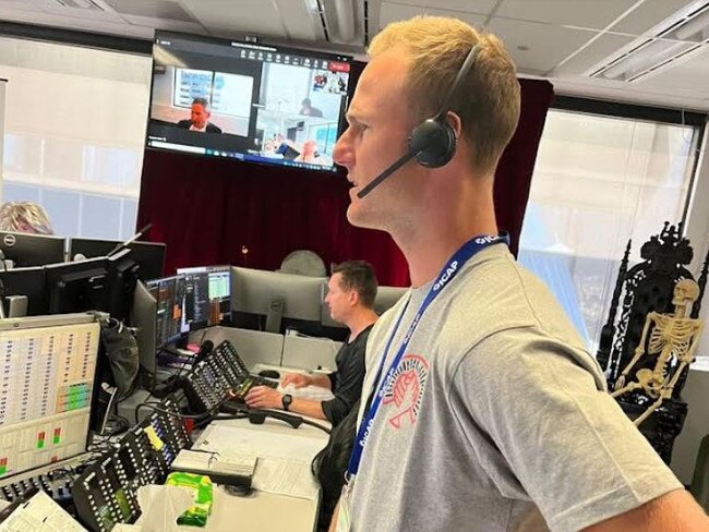 Daly Cherry-Evans on the phones as part of the ICAP Charity Day.