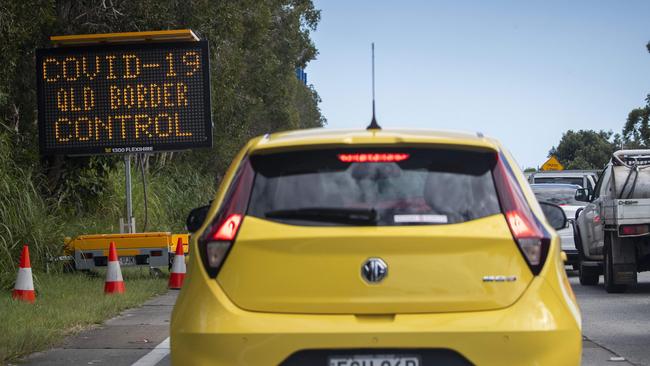 26th March 2020Traffic is seen backed up from New South Wales entering Queensland on the Gold Coast Hwy at Coolangatta. Police roadblocks have been set up designed to stop the spread of Covid-19.Photo: Glenn Hunt / The Australian