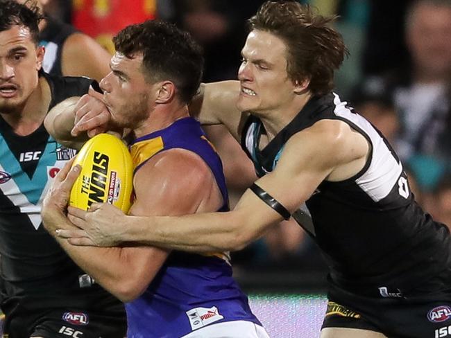 ADELAIDE, AUSTRALIA - SEPTEMBER 09: Luke Shuey of the Eagles is tackled by Jared Polec of the Power illegally before kicking the winning goal during the AFL First Elimination Final match between Port Adelaide Power and West Coast Eagles at Adelaide Oval on September 9, 2017 in Adelaide, Australia. (Photo by AFL Media/Getty Images)