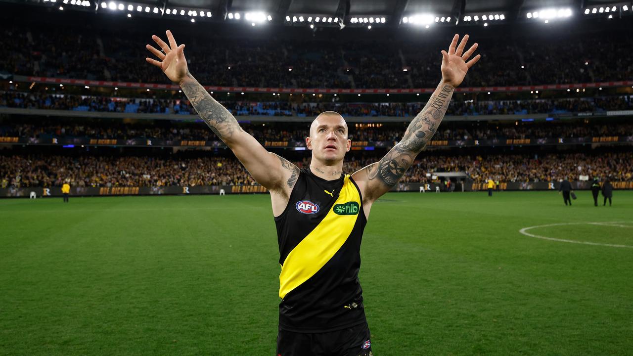 MELBOURNE, AUSTRALIA - JUNE 15: Dustin Martin of the Tigers recognises the crowd after his 300th match during the 2024 AFL Round 14 match between the Richmond Tigers and the Hawthorn Hawks at The Melbourne Cricket Ground on June 15, 2024 in Melbourne, Australia. (Photo by Michael Willson/AFL Photos via Getty Images)