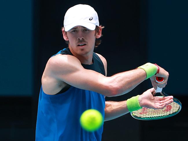 MELBOURNE, AUSTRALIA - JANUARY 04: Alex de Minaur of Australia plays a forehand during a practice session ahead of the 2025 Australian Open at Melbourne Park on January 04, 2025 in Melbourne, Australia. (Photo by Kelly Defina/Getty Images)