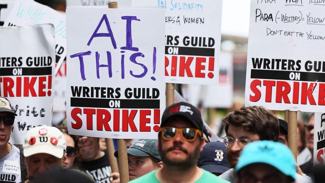 Members of the Writers Guild of America East are joined by SAG-AFTRA members as they picket at the Warner Bros. Discovery office in New York City. Picture: Michael M. Santiago / Getty Images North America / Getty Images via AFP